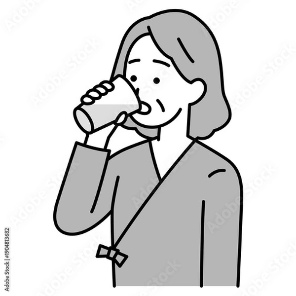 Obraz バリウムを飲む検査着の年配の女性