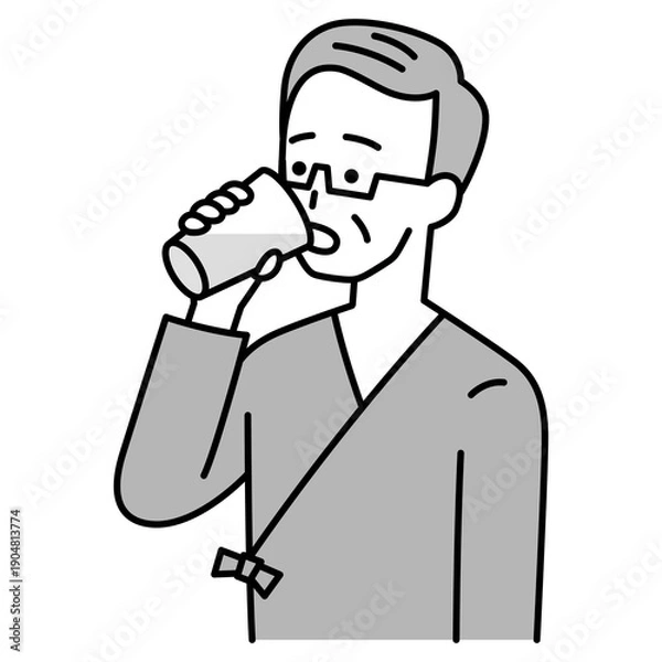 Obraz バリウムを飲む検査着の年配の男性