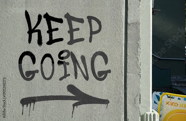 Obraz Keep Going message graffiti painted on urban wall