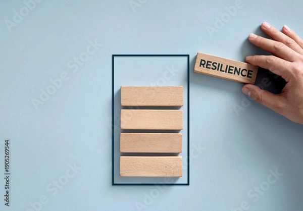 Obraz Hand adding resilience block to a full battery