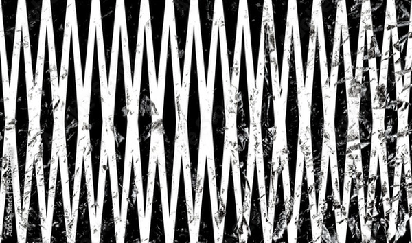 Obraz 黒の色の背景に白のクロスしたような形のオブジェクトが並ぶ模様の柄でざらざらとした質感の表面の石の破片やほこりのようなものが舞うデザインのイラストの画像、装飾物、背景、壁紙、テクスチャのグラフィックの素材