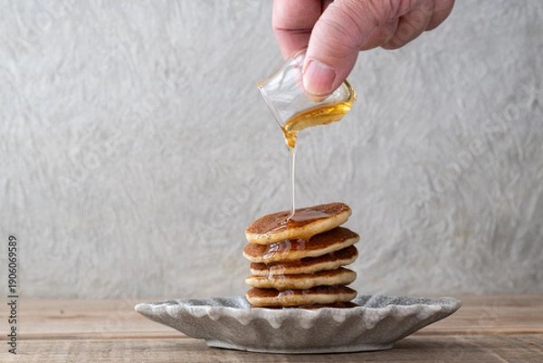 Obraz ホットケーキにはちみつを垂らす