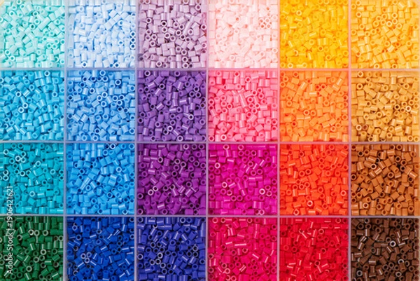 Obraz colorful plastic polymer granules background