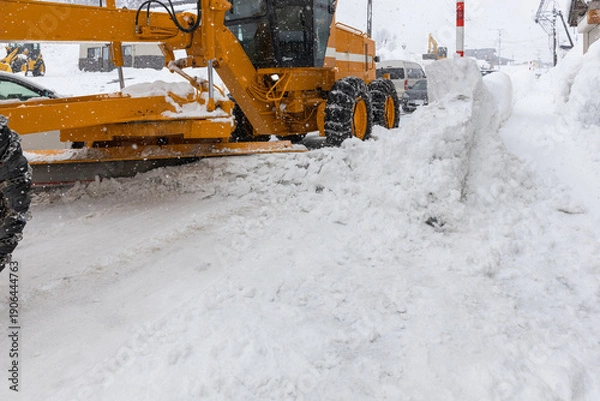 Obraz 道路の除雪をする除雪グレーダ