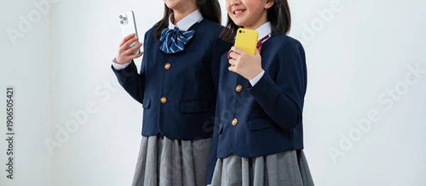 Obraz スマホを持つ学生