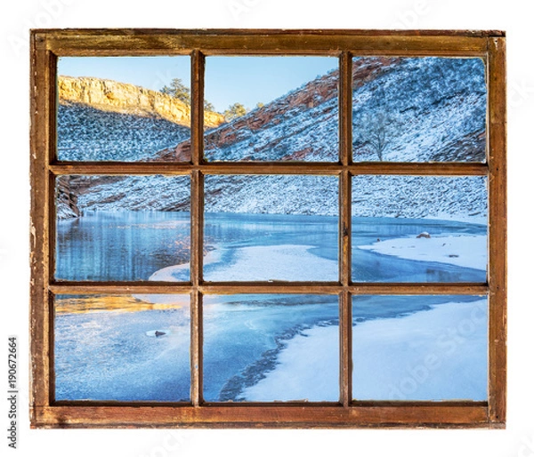 Fototapeta mountain lake in winter window view