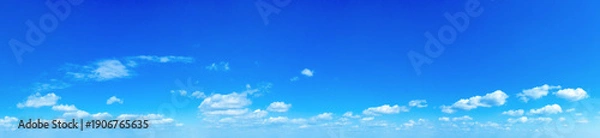 Fototapeta Blue Sky background with tiny Clouds. Panorama background