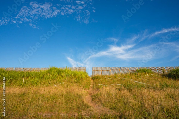 Obraz 新潟　夕暮れの空と柵
