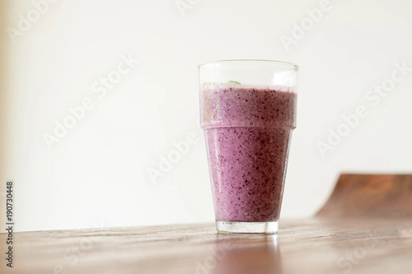 Fototapeta Mix berry smothie on wooden table