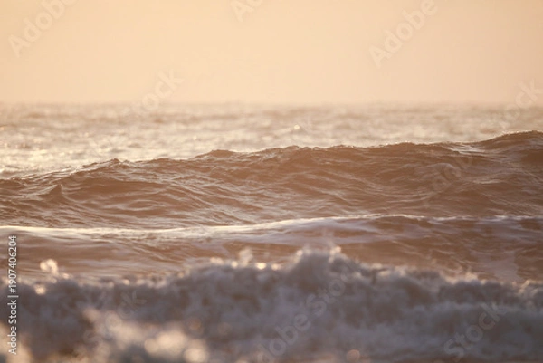 Obraz 朝焼けに染まる波