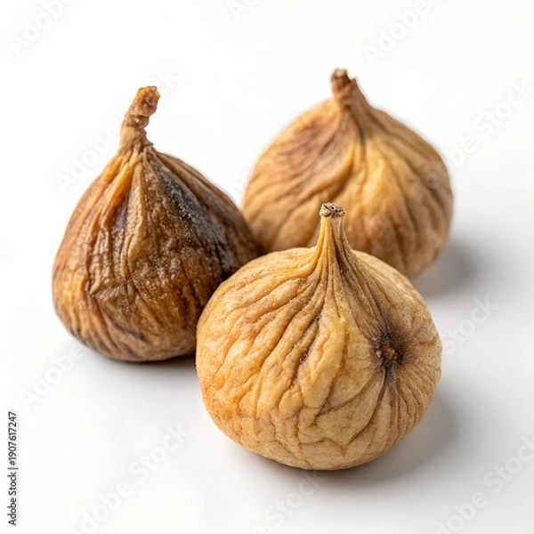 Obraz Three dried figs on a white background
