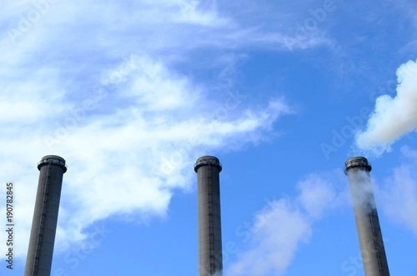 Obraz three chimneys and blue sky