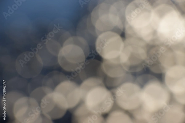 Obraz Abstract white bokeh on dark blue background