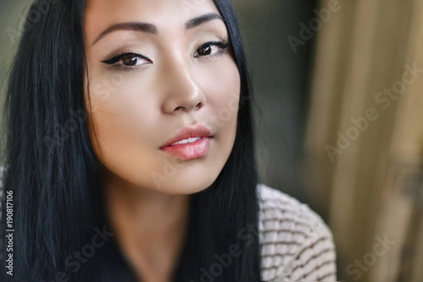 Fototapeta Model posing looking at camera