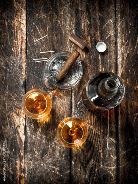 Fototapeta French cognac with a cigar.