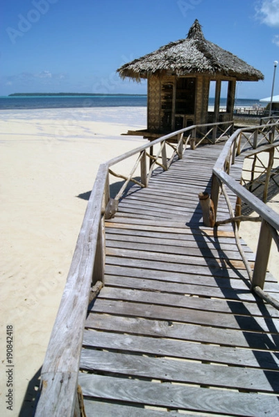 Fototapeta Stilt Hut on Boardwalk Bridge in Siargao