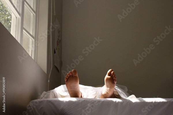 Obraz the feet of a person who is sleeping