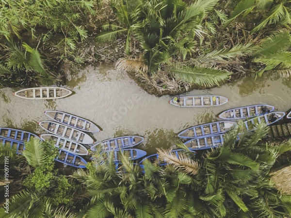 Fototapeta Drone view of a small river with wood boats