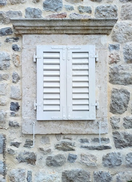 Fototapeta old window with shutters