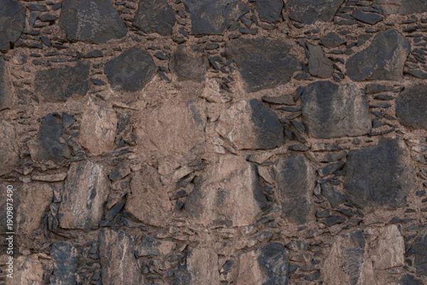 Obraz Ancient rustic volcanic stone wall texture background for design