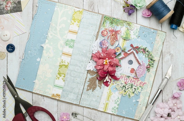 Obraz creative workplace with a card, scrapbooking