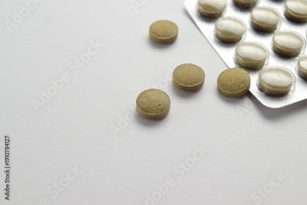 Obraz Herbal tablets in blister pack on light background