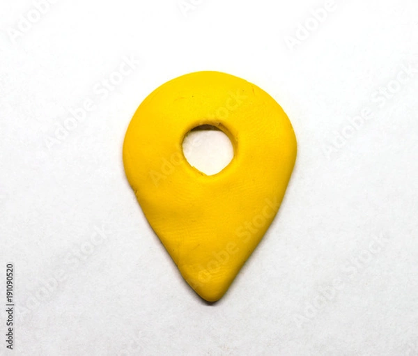 Fototapeta Modelling clay navigation sign on white background. Yellow pointer isolated.