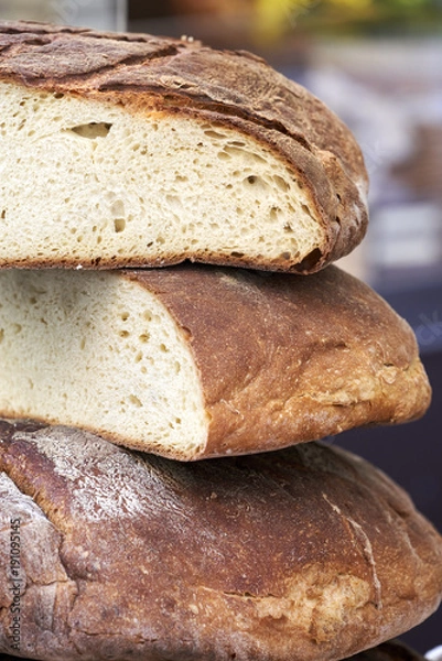 Obraz Freshly baked Tuscan bread cut into large slices