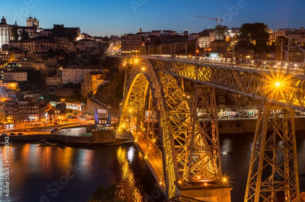 Fototapeta Evening view at Porto, Portugal. View at Ribeira and Dom Luis I Bridge.