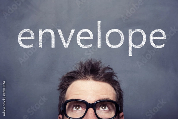 Fototapeta Businessman front of the blackboard with envelope signs