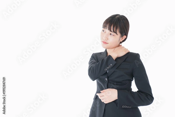 Obraz 肩こり・腰痛に苦しむ若いビジネスウーマン