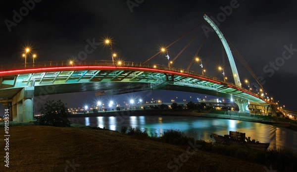 Obraz Dazhi bridge at night with lights relfecting in the water, Taipei, Taiwan