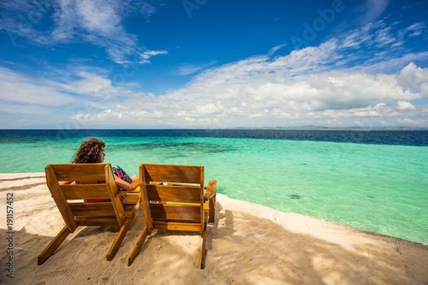 Obraz Beach chairs, clear water and beautiful view on tropical island,