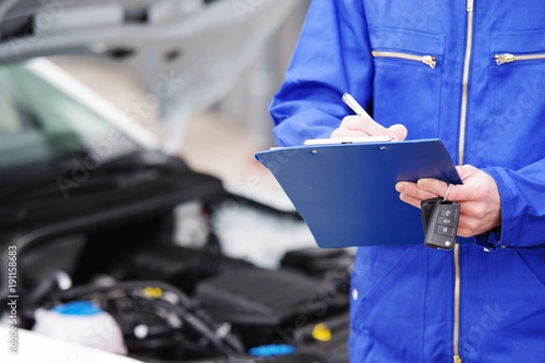 Obraz Mechanik podczas przeglądania samochodu, badanie Tüv