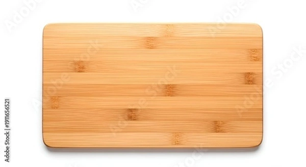 Fototapeta Rectangular bamboo cutting board on a white background top view.