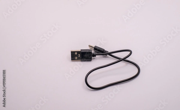 Obraz USB cable coiled up isolated on white background