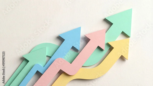 Obraz パステルカラーの紙が層になって重なり、ふんわりとした影を落としながら上昇する矢印を描いています。優しく右肩上がりに伸びる曲線は、無理のない成長や調和のとれた発展を象徴しています。教育関連やクリエイティブなプロジェクト、女性向けのビジネス資料に最適です。