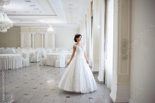 Fototapeta Beautiful bride in wedding dress