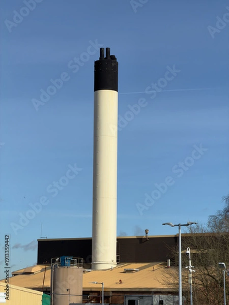 Obraz Environment polluting industrial chimney stack from industrial units.