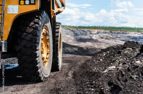Fototapeta Big dump truck is mining machinery, or mining equipment to transport coal from open-pit or open-cast mine as the Coal Production