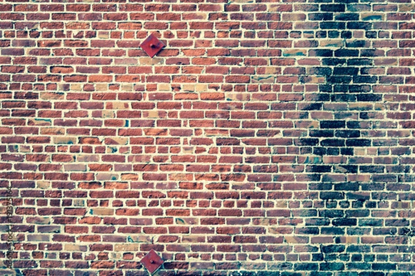 Obraz Aged photo on redbrick wall
