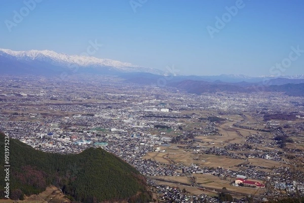 Obraz 信州　霧訪山 洞ノ峰　から望む北アルプス　塩尻市街