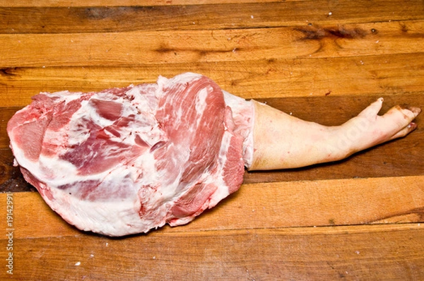 Obraz Pork leg on wooden table