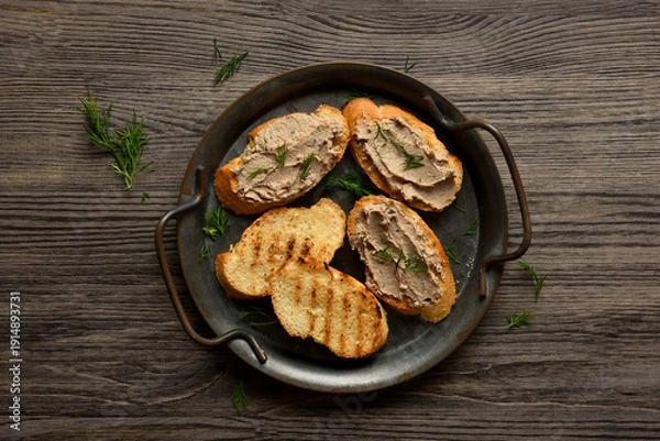 Fototapeta Liver pate on toasted bread