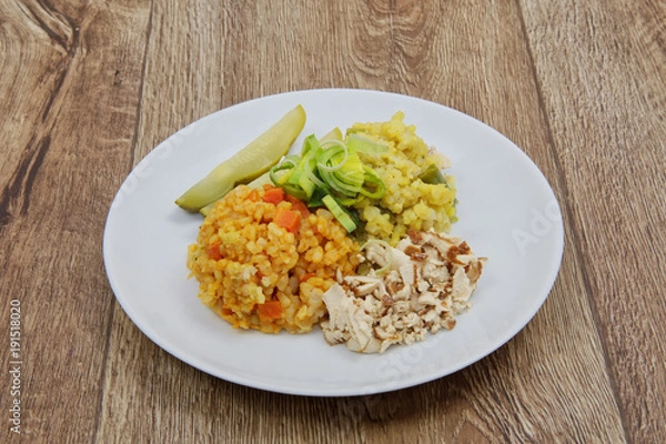 Fototapeta Risotto of two colors on a table