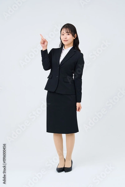 Obraz 指を立てるポーズをするビジネスウーマン