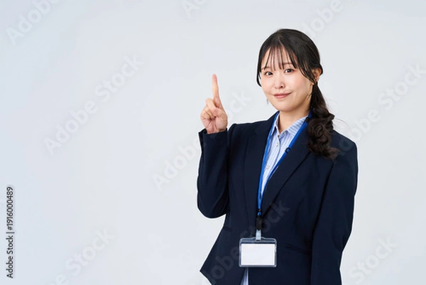 Obraz 指を立てるポーズをするビジネスウーマン
