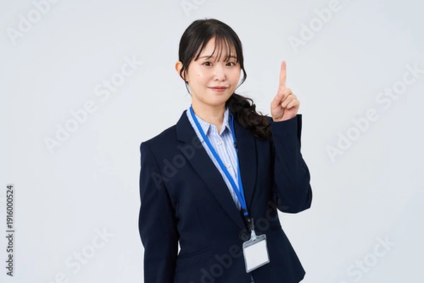 Obraz 指を立てるポーズをするビジネスウーマン