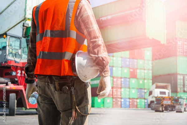 Obraz Employees who are inspecting container transportation