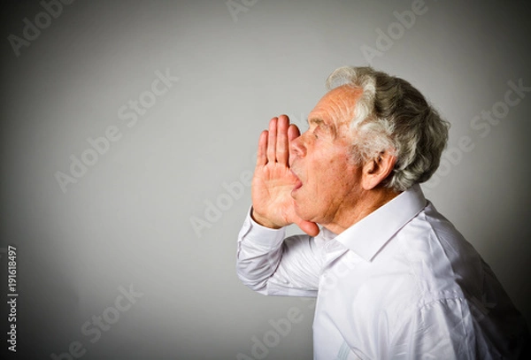 Obraz Old man in white is screaming.